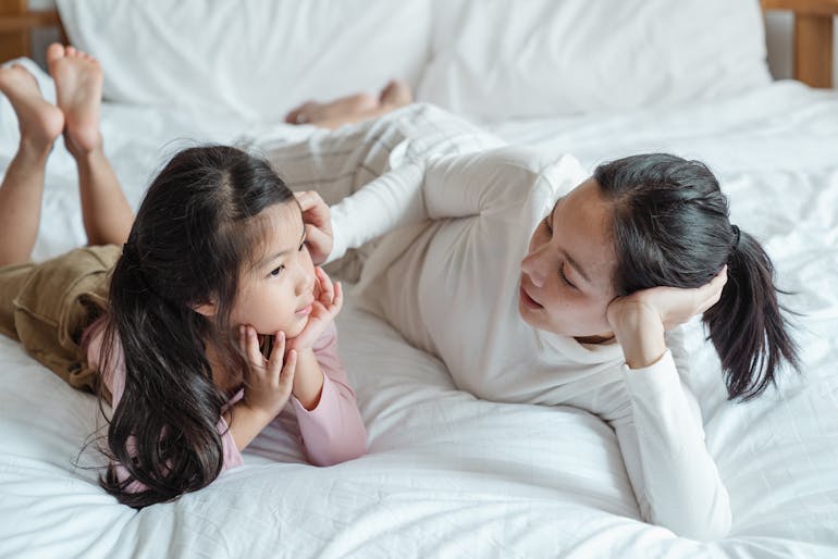 a mother talking to her daughter about the move