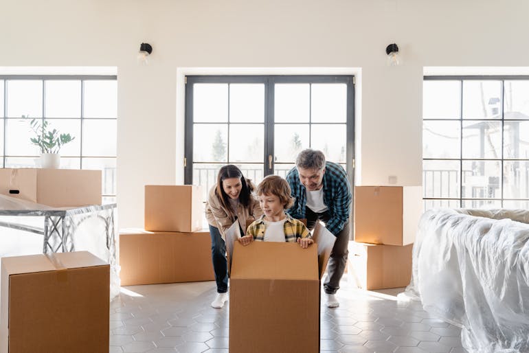 a happy family moving in